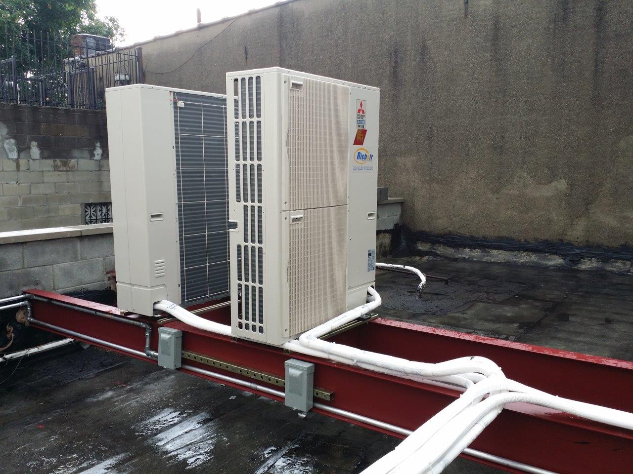 Ductless mini split condensors on roof Ductless Installations: VLS Pharmacy In Brooklyn, New York