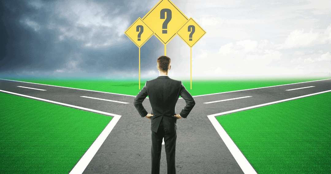Choices Ahead: A professional weighing his options at a crossroads. Suited man contemplating between two diverging paths.